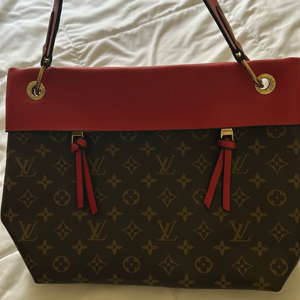 Small Dark Brown and Red Purse with tassels. One Area inside.